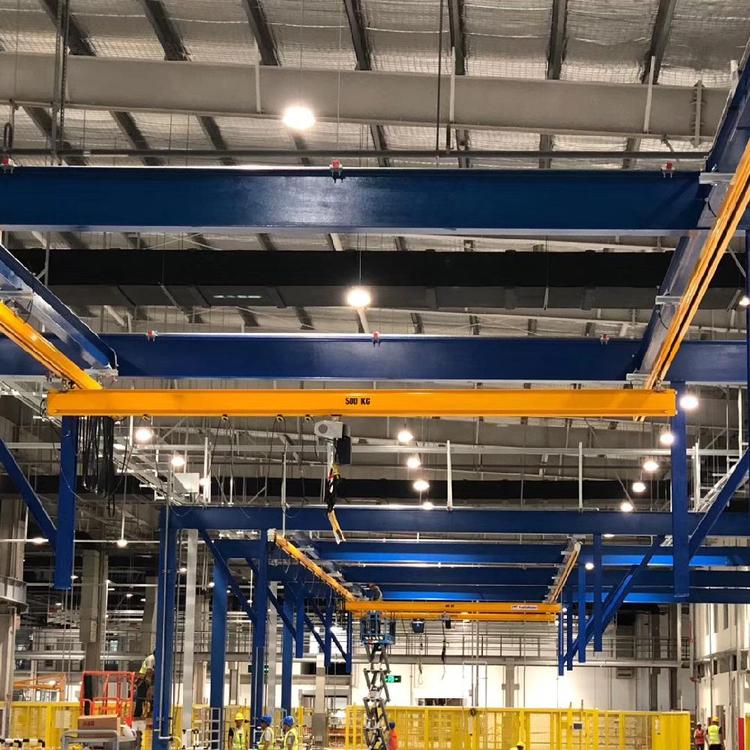KBK modular crane system in mechanical parts workshop